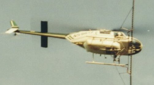 Chemtrail sprayings over Bossier, LA on 04-19-2001, sprayer helicopter Bell 206B