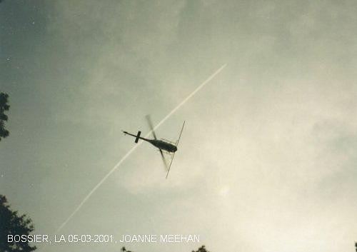 Chemtrail sprayings over Bossier, LA on 04-19-2001, helicopter above